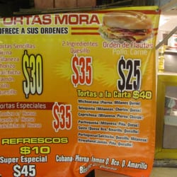 Super Tortas Cubanas - Menu with chef pictured.