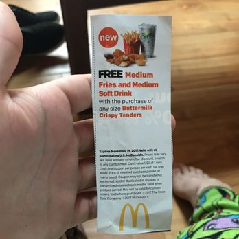 McDonald's - a person holding up a coup for fries and medium - Fast Food Near Me - Adams, New York