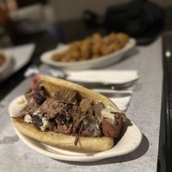 Tank House BBQ and Bar - Chopped brisket sandwich w/tots