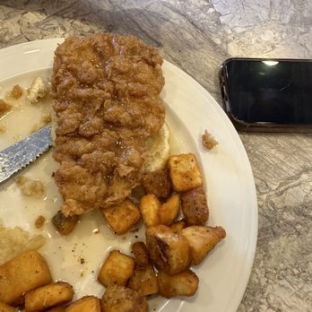 Cafe Volare - Chicken biscuit with breakfast potatoes - Breakfast & Brunch Near Me - Enid, Oklahoma
