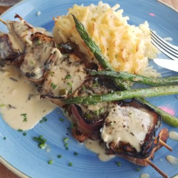 Beach House - Bacon-wrapped scallops. Bacon was burnt, scallops were cooked to perfection! - Bars Near Me - Pompano Beach, Florida
