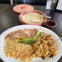 Nancy's Restaurant And Bakery - Huevos con chorizo. Comes with rice beans and tortillas.