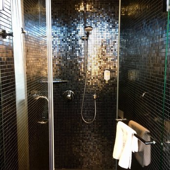 Hotel Riu Plaza Berlin - Walk in shower room, with conventional and rainforest shower heads. - Hotels Near Me - Berlin, BE