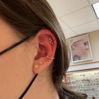 Almost Famous Body Piercing - Cute little snake cartilage piercing and silver hoop conch piercing, featuring my healed double lobes. - Piercing Near Me - St. Cloud, Minnesota Almost Famous Body Piercing - Cute little snake cartilage piercing and silver hoop conch piercing, featuring my healed double lobes. - Piercing Near Me - St. Cloud, Minnesota