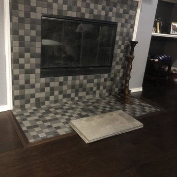 Tim Hogan's Dalton GA Carpet Outlet - Finished fireplace looks amazing. Tile is temporarily there while glue dries. - Carpeting Near Me - Fort Worth, Texas