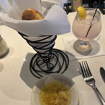 Orzo Trattoria - Nice warm bread with oil and roasted garlic - Italian Near Me - North Andover, Massachusetts Orzo Trattoria - Nice warm bread with oil and roasted garlic - Italian Near Me - North Andover, Massachusetts