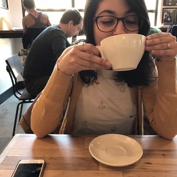 Bump 'n Grind - My sister enjoying her latte. - Coffee & Tea Near Me - Silver Spring, Maryland