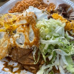 Cold, soggy, and tasteless "Chilaquiles", cold bland rice and beans. Cold, soggy, and tasteless "Chilaquiles", cold bland rice and beans.