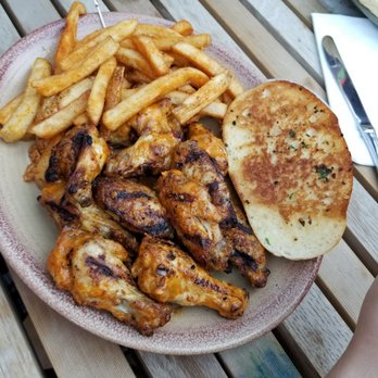 Nando's Peri-Peri - Wings, fries and garlic bread. *drool* - South African Near Me - Oakbrook, Illinois Nando's Peri-Peri - Wings, fries and garlic bread. *drool* - South African Near Me - Oakbrook, Illinois