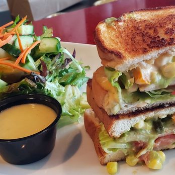 The Cutting Edge Cafe - Blackend chicken thigh, romaine, tomato, pickled corn, & avacado vinaigrette on potato bread w/ a side house salad (citrus dressing). - Sandwiches Near Me - Chesapeake, Virginia