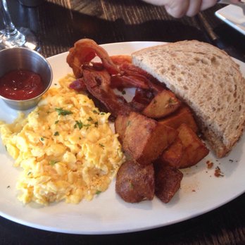 Station 4 - Two eggs scrambled with bacon and home fries! Absolutely delicious, especially coupled with bottomless mimosas - New American Near Me - Washington, DC, District of Columbia Station 4 - Two eggs scrambled with bacon and home fries! Absolutely delicious, especially coupled with bottomless mimosas - New American Near Me - Washington, DC, District of Columbia