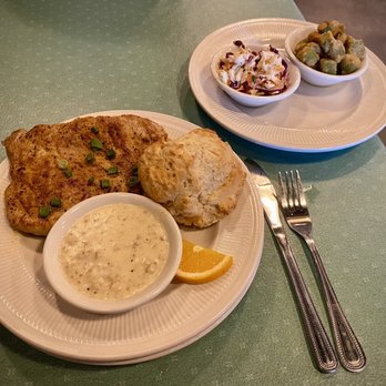 Crazy Pig Southern Kitchen - The Southern House special at Crazy Pig. Pork, biscuit, gravy. Sides are Cajun slaw and fried okra. - American Near Me - Mandeville, Louisiana
