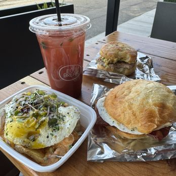 Egg Break - Bacon egg and cheese - A big pig in a honey biscuit- bravas potatoes - The Bountiful OJ - Breakfast & Brunch Near Me - South Salt Lake, Utah