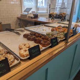a variety of doughnuts on display a variety of doughnuts on display