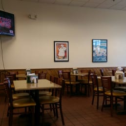 Nice clean seating area with big screen TVs!