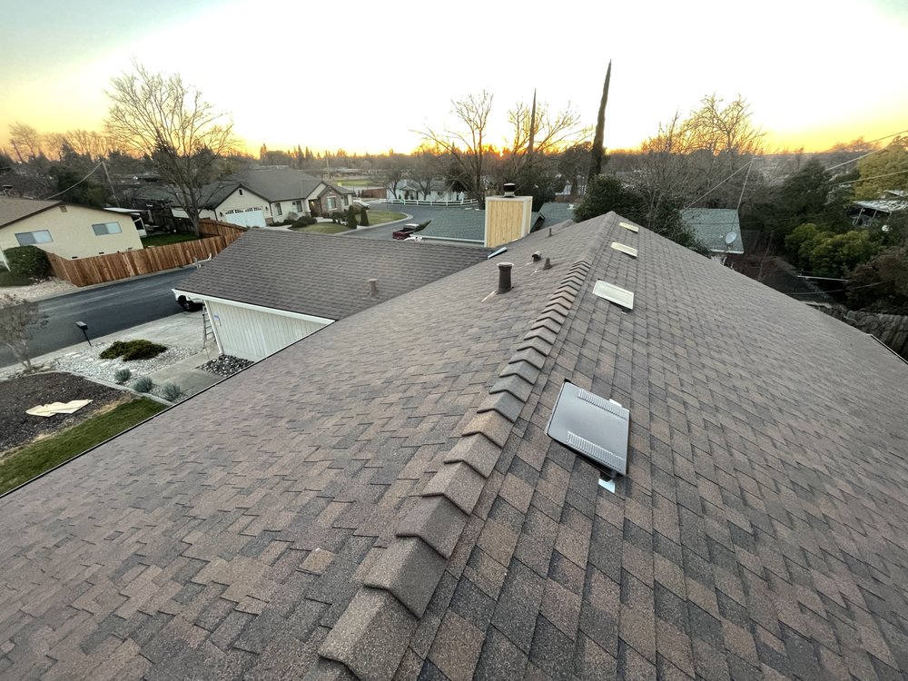 Slide of Triark Roofing