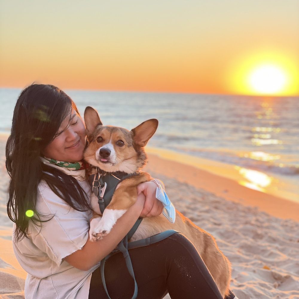 Oval Beach - My dog & I enjoying the sunset together at Saugatuck Harbor Natural Area! - Beaches Near Me - Saugatuck, Michigan