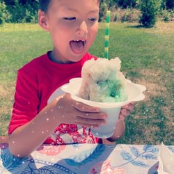 Shaka Shave Ice - He's loving his own 3 flavor creation: root beer, cotton candy, and gummy bears lol