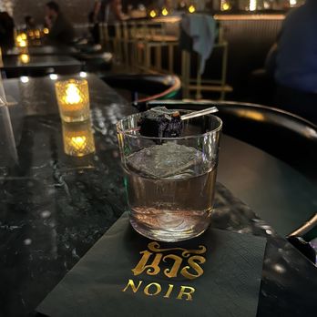 Noir Bar - Celestial bloom drink ft ube brownie from sampaguita - Bars Near Me - Orlando, Florida