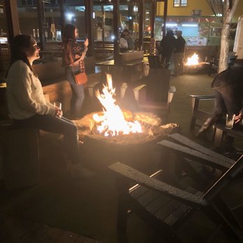 Pins Mechanical - People enjoying the outside around the fire pit. It's 35 degrees. - Bowling Near Me - Columbus, Ohio