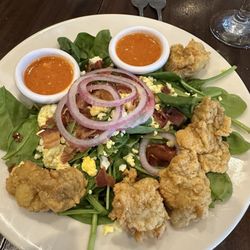 Que Sera - Spinach salad with fried oysters