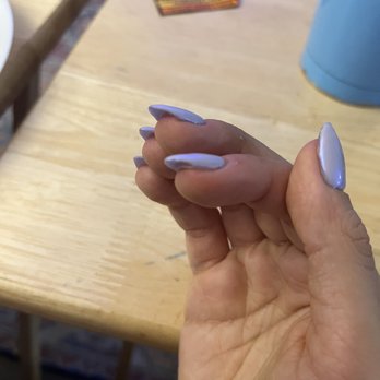Rika nail salon - gel x extension not glued down to the tip on natural nail; picture taken IMMEDIATELY after nail appointment. can see pink natural bed. - Nail Salons Near Me - Brooklyn, New York