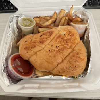 Silvia's Tacos - a chicken sandwich and french fries - Tacos Near Me - Groves, Texas Silvia's Tacos - a chicken sandwich and french fries - Tacos Near Me - Groves, Texas
