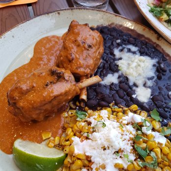 Cantina Laredo - Carnitas with street corn & beans. - Mexican Near Me - Virginia Beach, Virginia