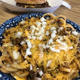 a plate of cheese fries a plate of cheese fries