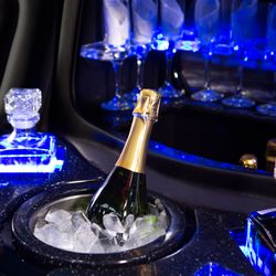 Black Tie Transportation - Complimentary champagne. CHEERS!