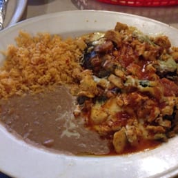 Chiles poblanos with grilled chicken, rice, and refried beans Chiles poblanos with grilled chicken, rice, and refried beans