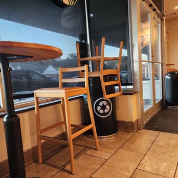 Starbucks - Chair on top of a recycling can - Coffee & Tea Near Me - Stamford, Connecticut Starbucks - Chair on top of a recycling can - Coffee & Tea Near Me - Stamford, Connecticut