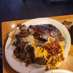 Ribs, small steak, & loaded baked potato!