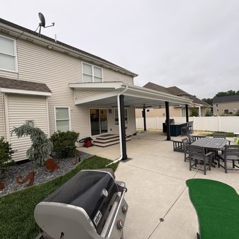 NWI Patio Pros - Overhang, built in bar, steps off house. - General Contractors Near Me NWI Patio Pros - Overhang, built in bar, steps off house. - General Contractors Near Me