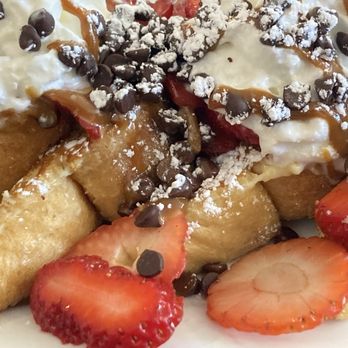 Le Peep - My order of Tres Leches French Toast with fresh strawberries and a drizzle of Nutella. - Breakfast & Brunch Near Me - Edison, New Jersey