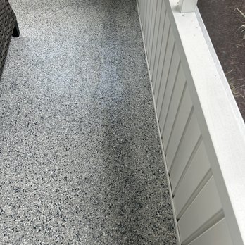 Garage Guard - You can see that it not only has a high gloss finish but the repair actually darkened the floor in the areas repaired. - Flooring Near Me - Brunswick, Georgia
