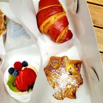 OfKors Bakery - Sept 2021: Pic 21 of 29-- This is how staff boxes pastries (carefully:) - Coffee & Tea Near Me - Sarasota, Florida OfKors Bakery - Sept 2021: Pic 21 of 29-- This is how staff boxes pastries (carefully:) - Coffee & Tea Near Me - Sarasota, Florida