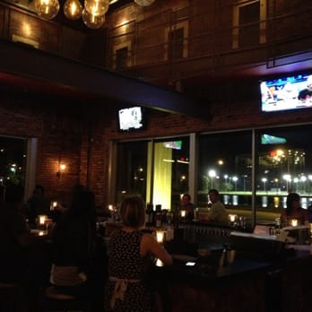 Trata - Lower bar area at night - New American Near Me - Rochester, New York Trata - Lower bar area at night - New American Near Me - Rochester, New York