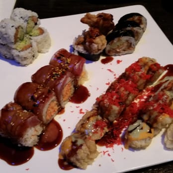 Fujiyama - Spider roll, Firecracker roll, BMW roll, and Alaska roll clockwise from top right - Japanese Near Me - Brookfield, Wisconsin