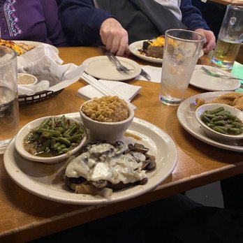 Texas Roadhouse - smothered KC strip with green beans and spicy rice - Steakhouses Near Me - St. Charles, Missouri Texas Roadhouse - smothered KC strip with green beans and spicy rice - Steakhouses Near Me - St. Charles, Missouri
