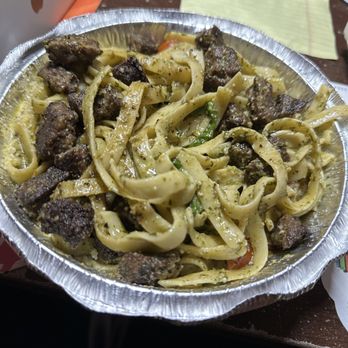 Funculo - spinach fettuccine with steak, cherry tomatoes, parmesan cheese and pesto sauce. - Pasta Shops Near Me - Panorama City, California Funculo - spinach fettuccine with steak, cherry tomatoes, parmesan cheese and pesto sauce. - Pasta Shops Near Me - Panorama City, California