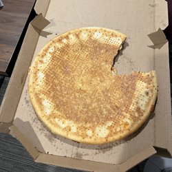 Pizza Hut - These Bozos purposely didn't cut through the pie