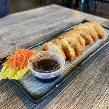 M&T CAFE & BAR - Gyoza Plate with tasty marinated carrot shreds - Coffee & Tea Near Me - Silverdale, Washington M&T CAFE & BAR - Gyoza Plate with tasty marinated carrot shreds - Coffee & Tea Near Me - Silverdale, Washington