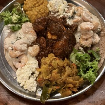 Toukoul - Our platter of food - shrimp / chicken / cabbage & carrots / chickpeas with turmeric - Ethiopian Near Me - Brussels, BRU