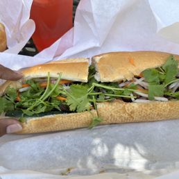 Grilled pork banh mi. Grilled pork banh mi.