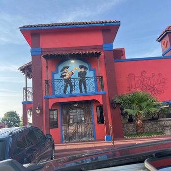 El Jarrito Mexican Grill - a red building with a blue balcony - Mexican Near Me - West Monroe, Louisiana El Jarrito Mexican Grill - a red building with a blue balcony - Mexican Near Me - West Monroe, Louisiana