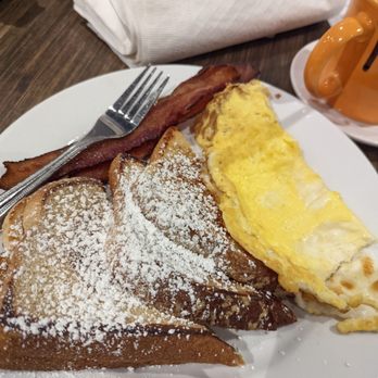 Famous Toastery - French toast, eggs fried over hard and bacon - Breakfast & Brunch Near Me - Charlotte, North Carolina Famous Toastery - French toast, eggs fried over hard and bacon - Breakfast & Brunch Near Me - Charlotte, North Carolina