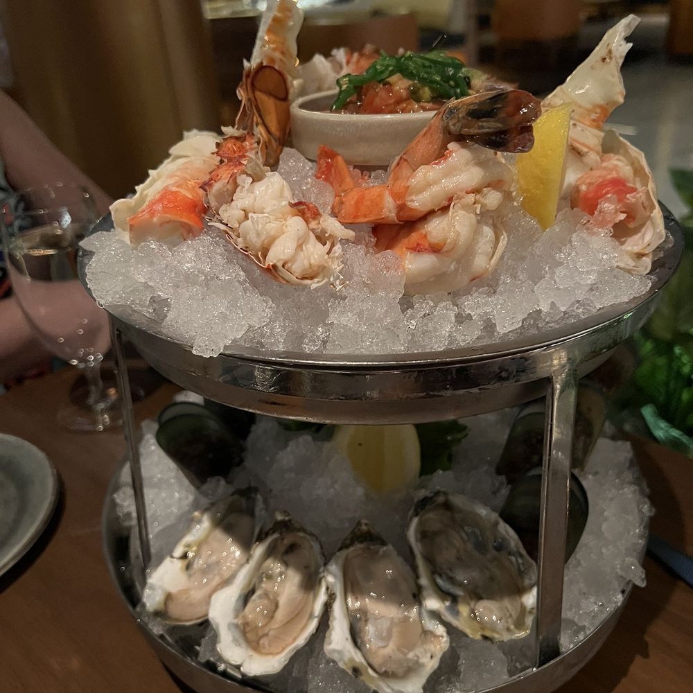 Ramsay's Kitchen - Large seafood tower, with variety of mussels, jumbo shrimp, two variety of oysters, lobster and ceviche - New American Near Me - Las Vegas, Nevada Ramsay's Kitchen - Large seafood tower, with variety of mussels, jumbo shrimp, two variety of oysters, lobster and ceviche - New American Near Me - Las Vegas, Nevada
