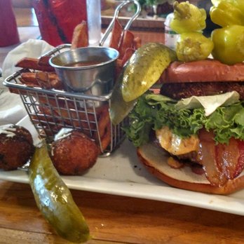 Hops Burger Bar - You can see two of my fried goat cheese ball appetizer that came with fig glaze and asiago cheese. Everything was fantastic. - Burgers Near Me - Greensboro, North Carolina Hops Burger Bar - You can see two of my fried goat cheese ball appetizer that came with fig glaze and asiago cheese. Everything was fantastic. - Burgers Near Me - Greensboro, North Carolina