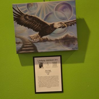 Little Green Hive - One of the artworks on the wall with information about the work and the local artist who created it. - Coffee & Tea Near Me - Roanoke, Virginia